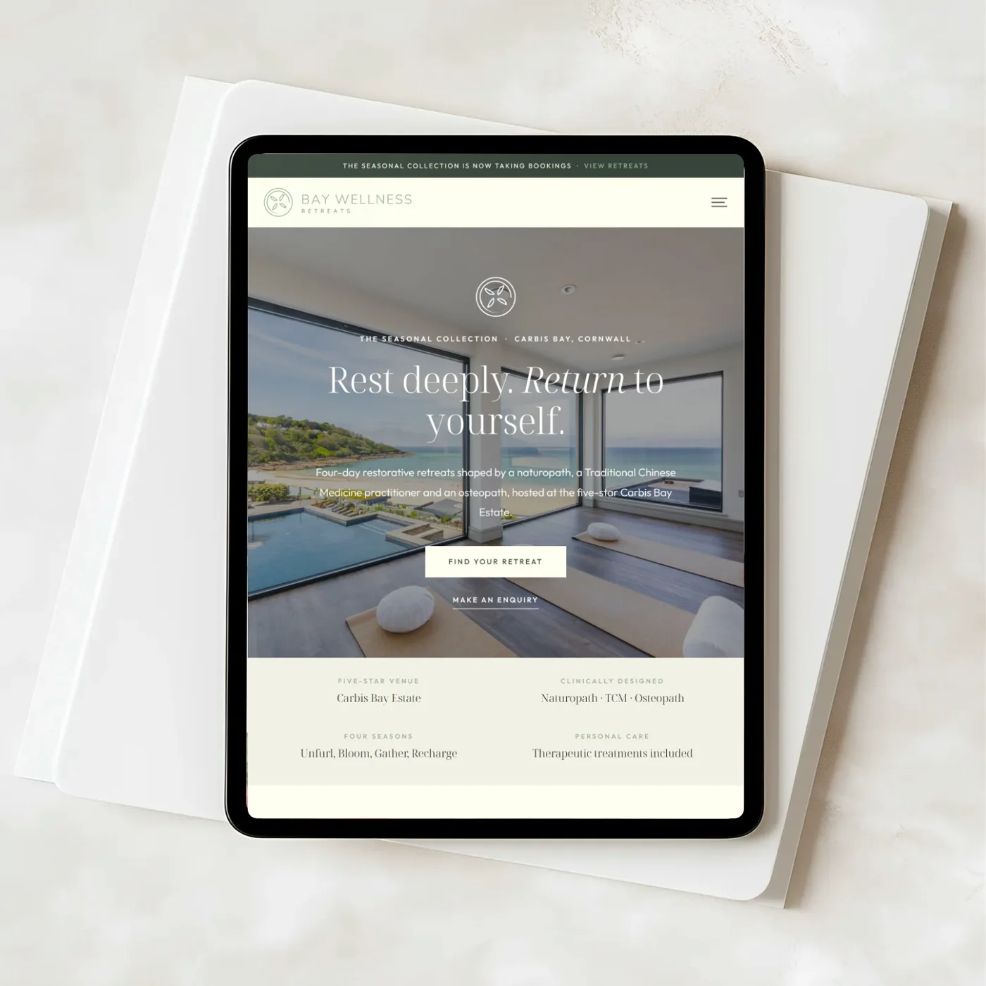Bay Wellness Retreats website on an iPad