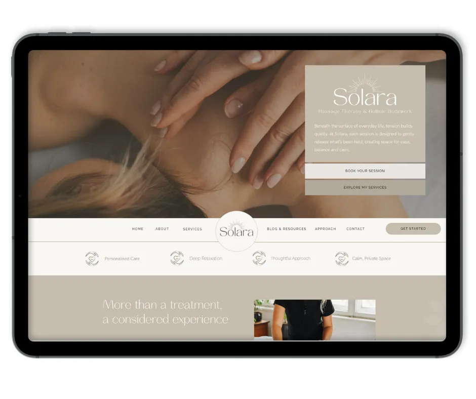 Massage studio website with treatment prices shown on a tablet